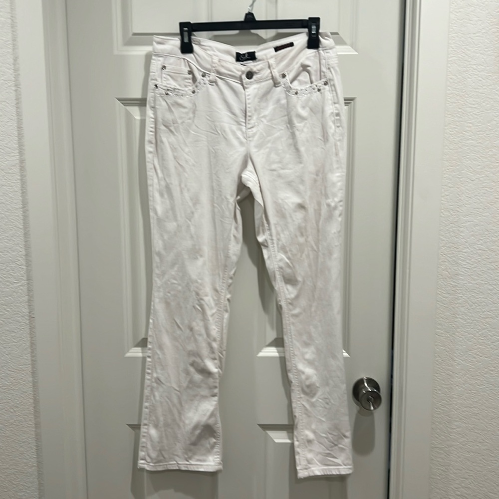 White jeans with rhinestone embellishment on pockets. Size 12.